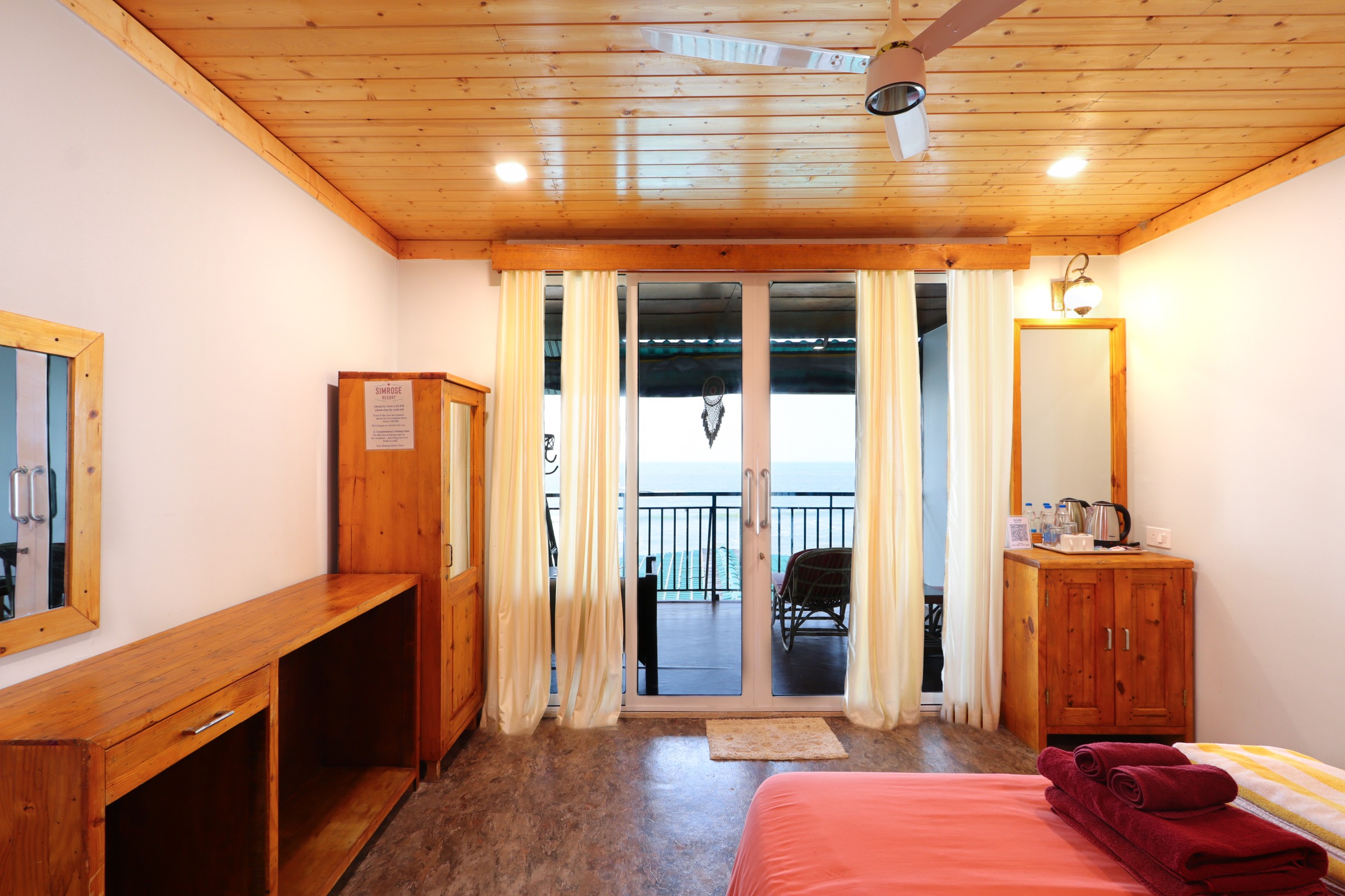 https://simrose-goa.com/stagliveaug/wp-content/uploads/2024/11/Bedroom-sea-view.jpg